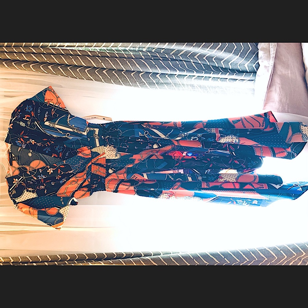 Aqua dress from Bloomingdales. Never worn, NWT.